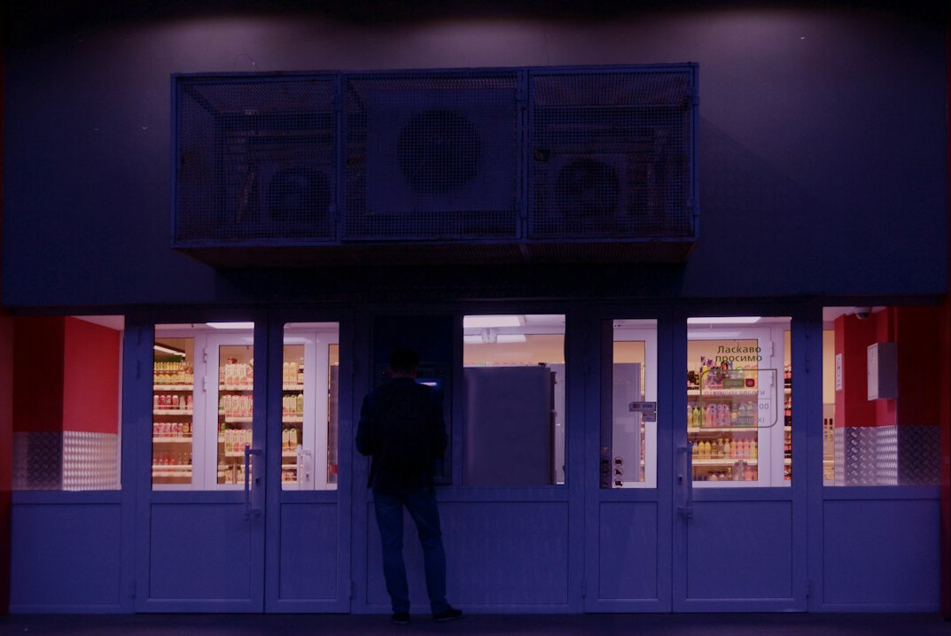 store detective observing aisle