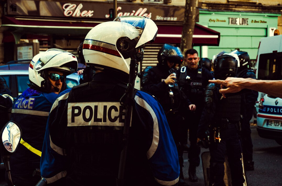 police arresting suspects